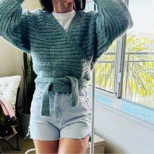 Warm cardigan to be worn over clothes. Good as new,